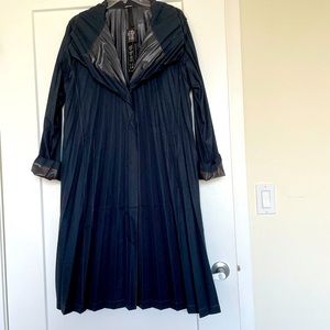 NWT Komarov pleated swing coat. True denim blue colour. contrast stitching seams